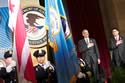 U.S. Attorney General Eric H. Holder, Jr., listens to the National Anthem with keynote speaker William C. Kellibrew.