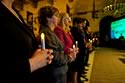 Attendees of 2010 National Observance and Candlelight Ceremony observe a moment of silence. 
