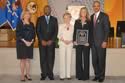 Special Courage Award recipient Michelle René Corrao with (from left) Joye E. Frost, Acting Director, Office for Victims of Crime; Fort Wayne Detective Art Billingsley; Assistant Attorney General Laurie O. Robinson, Office of Justice Programs; and U.S. Attorney General Eric H. Holder, Jr.