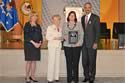 Allied Professional Award recipient Joanne Archambault with (from left) Joye E. Frost, Acting Director, Office for Victims of Crime; Assistant Attorney General Laurie O. Robinson, Office of Justice Programs; and U.S. Attorney General Eric H. Holder, Jr.