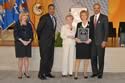 Federal Service Award recipient Marcia L. Rinker with (from left) Joye E. Frost, Acting Director, Office for Victims of Crime; Ronald C. Machen, Jr., United States Attorney for the District of Columbia; Assistant Attorney General Laurie O. Robinson, Office of Justice Programs; and U.S. Attorney General Eric H. Holder, Jr.