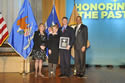 Photo of Ronald Wilson Reagan Public Policy Award recipient Brooks Douglass with (from left) Joye E. Frost, Acting Director, Office for Victims of Crime; Assistant Attorney General Laurie O. Robinson, Office of Justice Programs; and U.S. Attorney General Eric H. Holder, Jr.