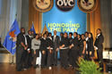 Photo of U.S. Attorney General Eric H. Holder, Jr., pictured with Voices of Praise.
