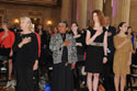 Photo of the award recipients and guests listening to the National Anthem at the 2012 National Crime Victims’ Service Awards Ceremony.