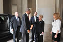 U.S. Attorney General Eric H. Holder, Jr., arrives at the Andrew Melon Auditorium and is greeted by Laurie O. Robinson, Acting Assistant Attorney General, Office of Justice Programs and Joye E. Frost, Acting Director, Office for Victims of Crime.