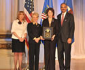 Award recipient Barbara Skudlarick, with (from left) Joye E. Frost, Acting Director, Office for Victims of Crime; Laurie O. Robinson, Acting Assistant Attorney General, Office of Justice Programs; and U.S. Attorney General Eric H. Holder, Jr.