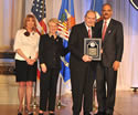 Award recipient William Van Regenmorter, with (from left) Joye E. Frost, Acting Director, Office for Victims of Crime; Laurie O. Robinson, Acting Assistant Attorney General, Office of Justice Programs; and U.S. Attorney General Eric H. Holder, Jr.