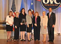 The Financial Litigation Unit of the U.S. Attorney's Office for the Eastern District of North Carolina receives an award from (left) Joye E. Frost, Acting Director, Office for Victims of Crime; Laurie O. Robinson, Acting Assistant Attorney General, Office of Justice Programs; and U.S. Attorney General Eric H. Holder, Jr.