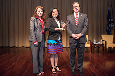 National Crime Victim Service Award recipient Shawn Partridge, MSW, with (from left) OVC Director Darlene Hutchinson and Principal Deputy Assistant Attorney General for the Office of Justice Programs Alan Hanson.