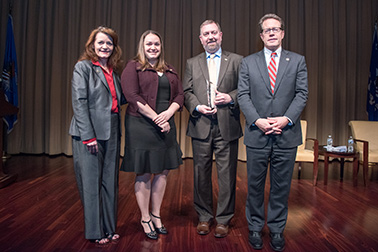 The Victim Services Unit Volunteers, Travis County Sheriff's Office, receive the Volunteer for Victims Award. Pictured from left: OVC Director Darlene Hutchinson, Heather Dooley, David Holmes, and Principal Deputy Assistant Attorney General for the Office of Justice Programs Alan Hanson.