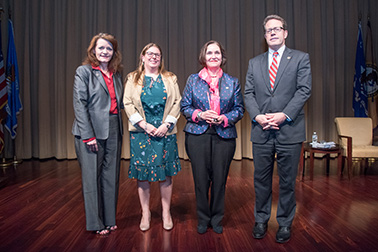 The Money Laundering and Asset Recovery Section, Criminal Division, U.S. Department of Justice, receives the Crime Victims Financial Restoration Award. Pictured from left: OVC Director Darlene Hutchinson, Jennifer Bickford, Alice Dery, and Principal Deputy Assistant Attorney General for the Office of Justice Programs Alan Hanson.
