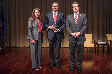 Al Stewart accepts the Award for Professional Innovation in Victim Services on behalf of the late Joye E. Frost. Pictured from left: OVC Director Darlene Hutchinson, Al Stewart, and Principal Deputy Assistant Attorney General for the Office of Justice Programs Alan Hanson.
