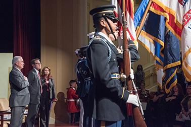 U.S. Attorney General Jeff Sessions, OVC Director Darlene Hutchinson, and Principal Deputy Assistant Attorney General for the Office of Justice Programs Alan Hanson stand for presentation of the colors by the Joint Armed Forces Color Guard at the 2018 National Crime Victims' Service Awards Ceremony.