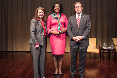 National Crime Victim Service Award recipient Tina L. Fox with (from left) OVC Director Darlene Hutchinson and Principal Deputy Assistant Attorney General for the Office of Justice Programs Alan Hanson.