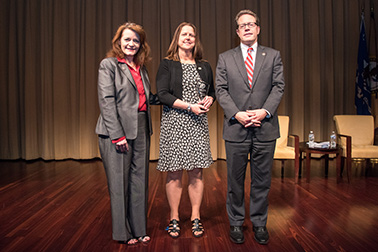 National Crime Victim Service Award recipient Debra McCall Reed with (from left) OVC Director Darlene Hutchinson and Principal Deputy Assistant Attorney General for the Office of Justice Programs Alan Hanson.