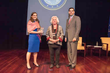 Special Courage Award recipient Laura L. Dunn, Esq. with (from left) Acting OVC Director Marilyn McCoy Roberts and Acting Associate Attorney General Jesse Panuccio.