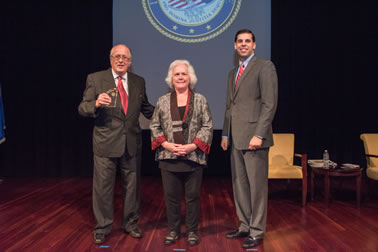 Ronald Wilson Reagan Public Policy Award  recipient Kendall L. Carver with (from left) Acting OVC Director Marilyn McCoy Roberts and Acting Associate Attorney General Jesse Panuccio.