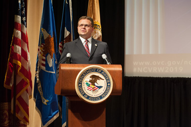 Principal Deputy Assistant Attorney General for the Office of Justice Programs Matt M. Dummermuth speaks at the 2019 National Crime Victims' Service Awards Ceremony.

