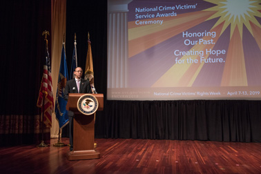 Deputy Attorney General Rod J. Rosenstein speaks at the 2019 National Crime Victims' Service Awards Ceremony.