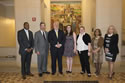 Photo of Greg Dorris, Amanda Dorris, and Courtland Dorris with Deputy Attorney General James M. Cole.