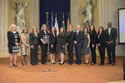 Photo of staff from Christiana Care Health System's Forensic Nurse Examiner Team accepting the Allied Professional Award. On stage with Joye E. Frost, Director, Office for Victims of Crime; Karol V. Mason, Assistant Attorney General, Office of Justice Programs; and Associate Attorney General Tony West are Anita Symonds, Christi Mench, Amy Stier, Christine Parks, Jennifer Oldham, Dr. Gordon Reed, Donna Lougheed, Erin Vaughn, and Jennifer Henry.