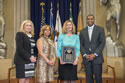 Photo of Ronald Wilson Reagan Public Policy Award recipient Pat Tuthill with (from left) Joye E. Frost, Director, Office for Victims of Crime; Karol V. Mason, Assistant Attorney General, Office of Justice Programs; and Associate Attorney General Tony West.