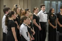 Photo of the Arlington Children's Chorus, a singing group, performing at the 2014 National Crime Victims' Service Awards Ceremony.