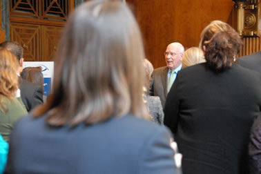 U.S. Senator Patrick J. Leahy (Vermont) arrives at the release event to applause from the attendees at the Capitol Hill release of the <em>Vision 21: Transforming Victim Services Framework</em>.