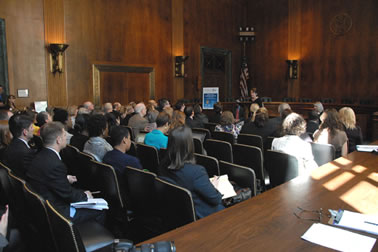 Attendees at the Capitol Hill release of the <em>Vision 21: Transforming Victim Services Framework</em> listen to remarks by Mary Lou Leary, Acting Assistant Attorney General, Office of Justice Programs.